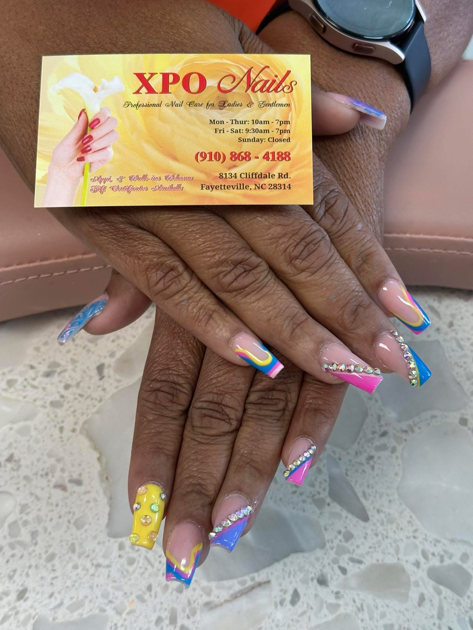 Xpo Nails & Spa logo